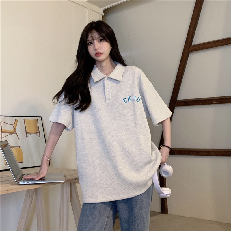 Áo polo SUXI tay ngắn dáng rộng màu trơn thêu chữ thời trang cho nữ