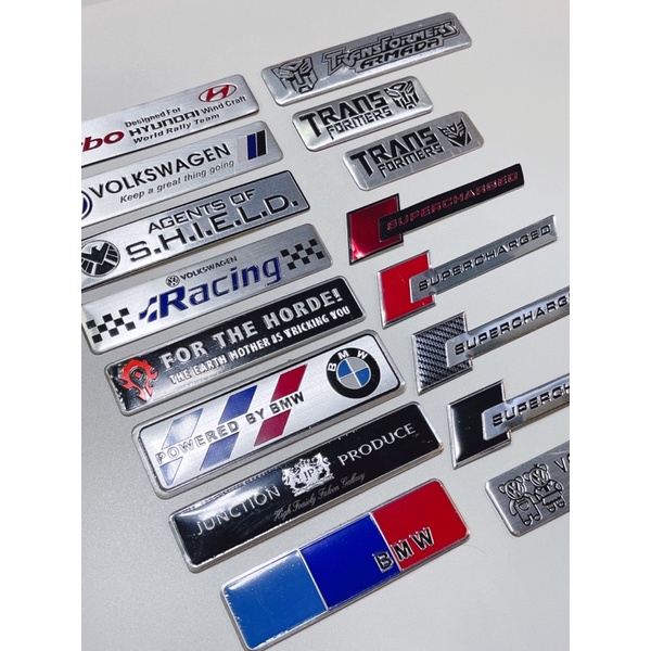 Tem nhôm chịu nhiệt tên các hãng xe và game, dán trang trí xe laptop tủ lạnh…