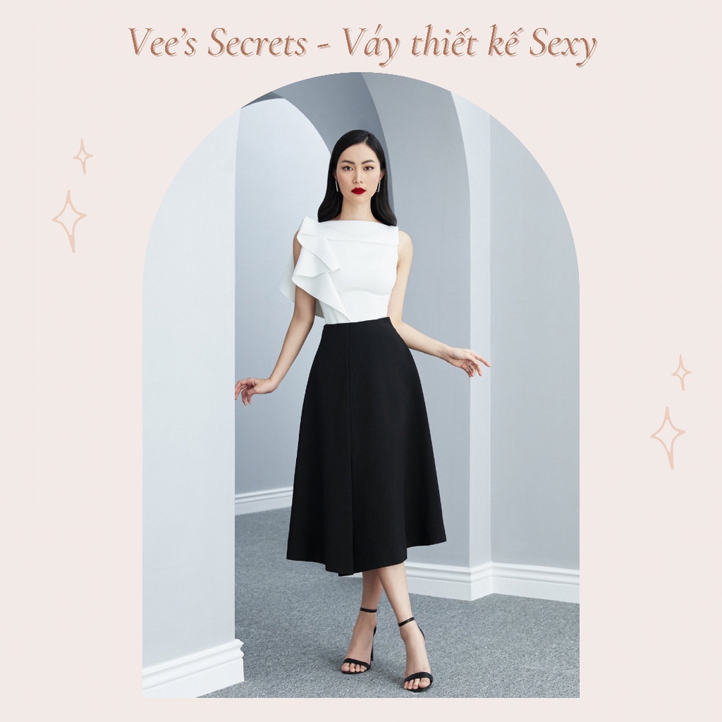 Set váy chữ A kèm áo kiểu sát nách hoạ tiết nơ 1 bên