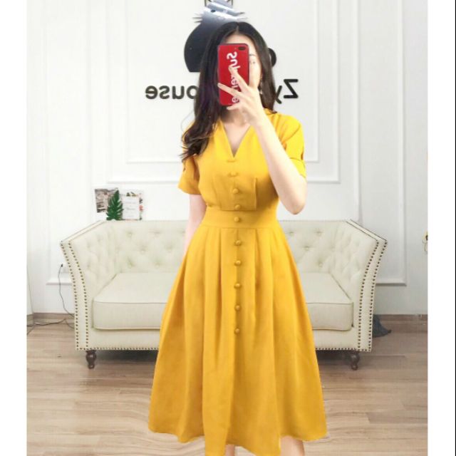 Đầm xếp ly nút bọc vải