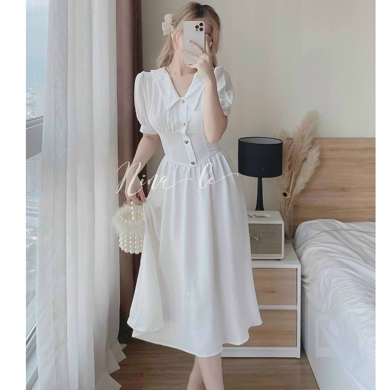 Đầm xòe eo cổ V phối nút