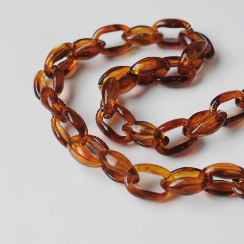 Quai đeo túi xách hình xích bằng acrylic độc đáo