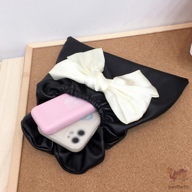 Túi xách cầm tay thiết kế xếp nếp gắn nơ thời trang Hàn Quốc cho trẻ em - người lớn