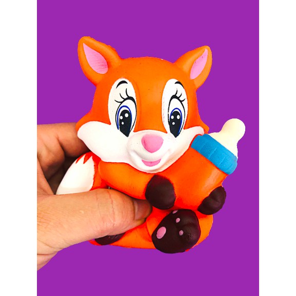 Đồ chơi Squishy BÉ CÁO MÀU CAM/MÀU HỒNG ôm bình sữa của mẹ