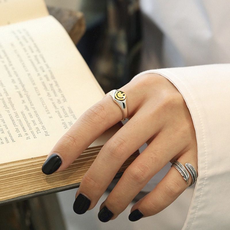 Nhẫn hình lông vũ thời trang cá tính độc đáo