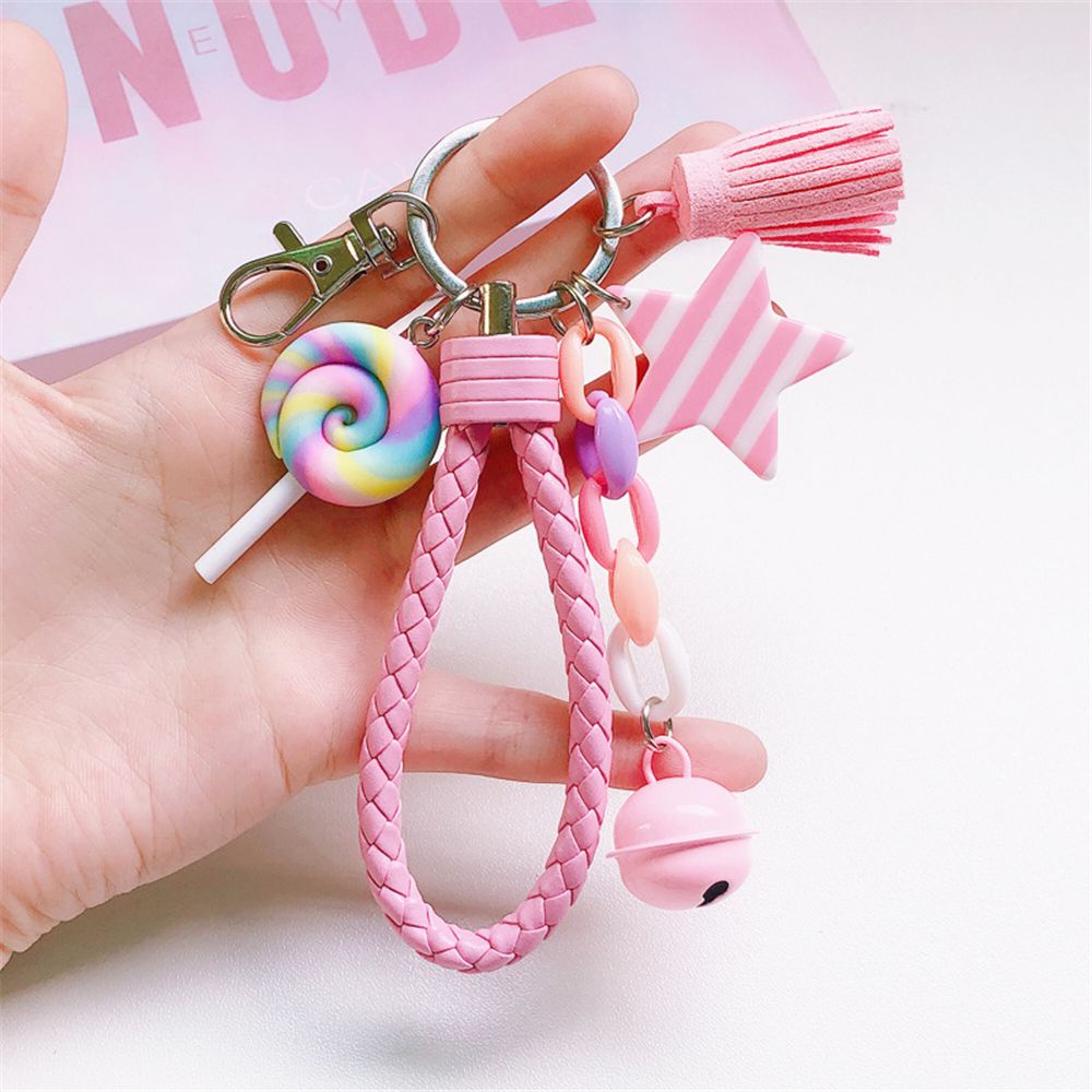 Móc khóa mặt hình kẹo mút có quả chuông phối dây tua rua nhiều màu ngọt ngào đáng yêu