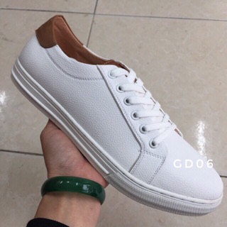 Giày trắng gót nâu Lacoste
