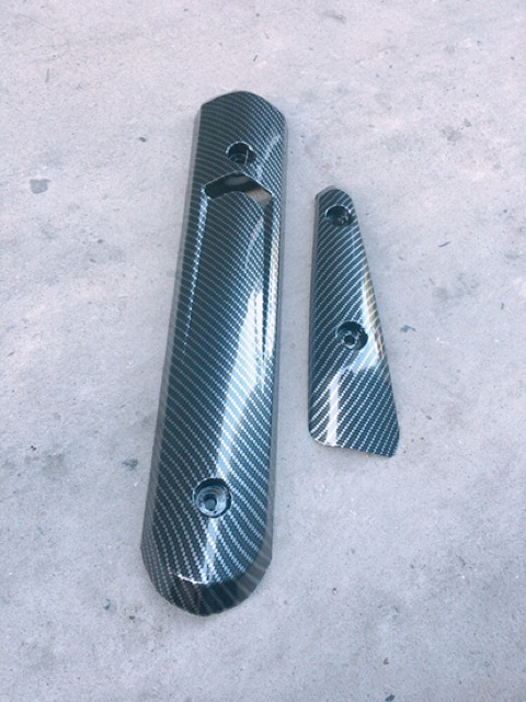 BỘ ỐP PÔ SPARK CACBON gồm 2 miếng nhựa chống cháy cao cấp như hình