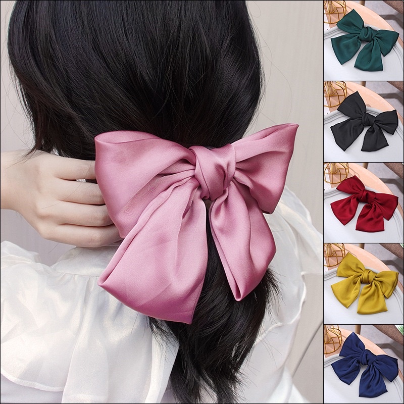 kẹp tóc nơ lụa mềm mại