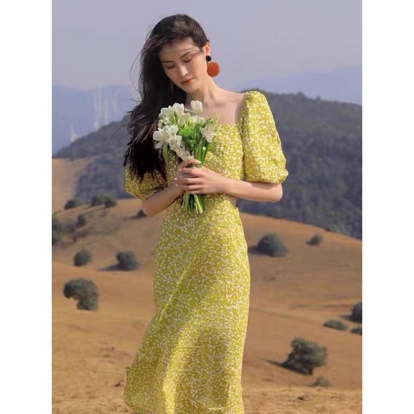Đầm midi  hoa vàng cut out eo