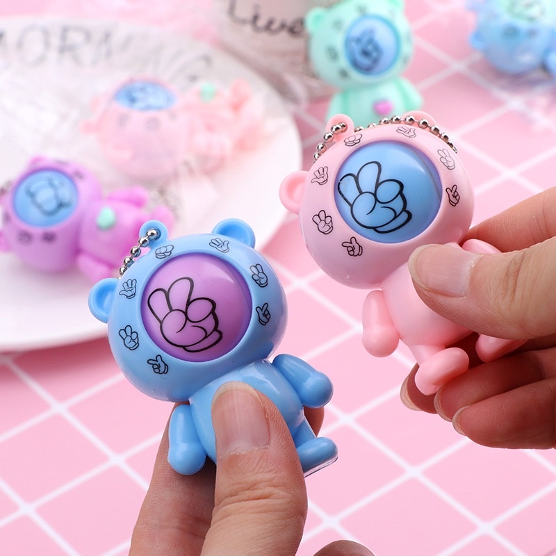 Móc khóa phi hành gia oẳn tù tì kéo búa bao có nút xoay ngẫu nhiên dễ thương Viễn Dương Computer