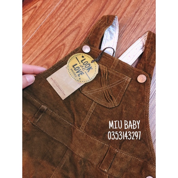 Yếm váy nâu xuat du bé gái