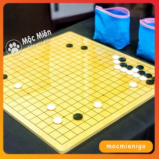 - bàn cờ gỗ ép 0.8cm và quân cờ sứ 1 mặt