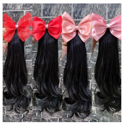 Kẹp tóc nơ xoăn dài cho bé