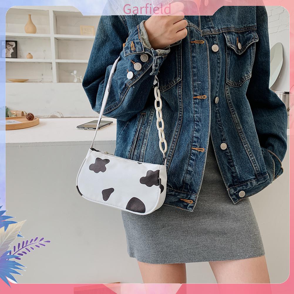 Túi xách tay tote PU họa tiết da bò sữa với chuỗi dây acrylic nhỏ gọn thời trang cho nữ