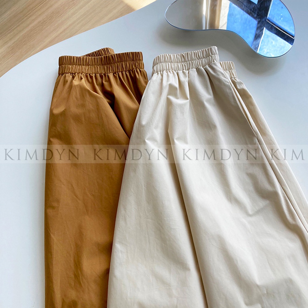 Chân váy midi dáng xoè lưng thun vải trơn mát KimDyn