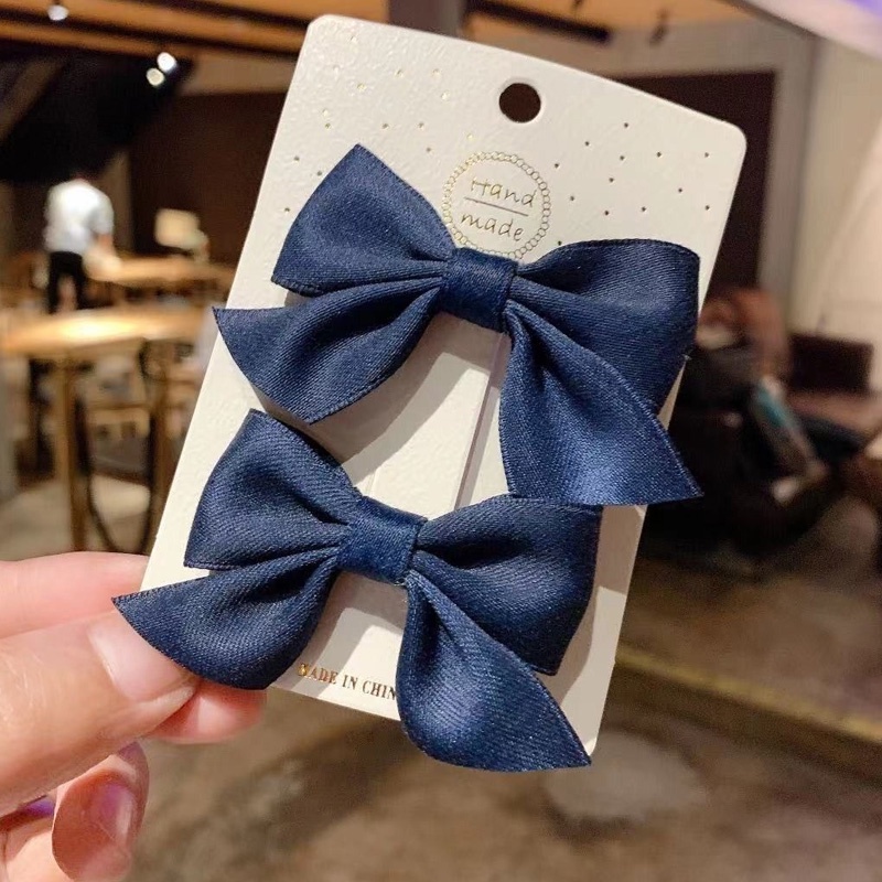 Set 2 kẹp tóc trang trí nơ đáng yêu dành cho bé gái