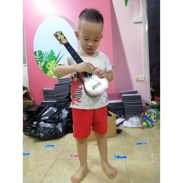 ĐÀN GUITAR CHO BÉ