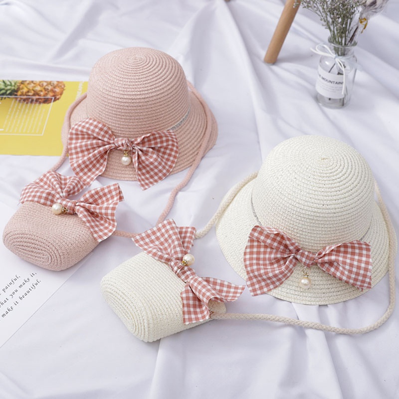 Set 2 món gồm nón cói đính nơ và túi xách tay chống tia UV thời trang đi biển mùa hè cho bé