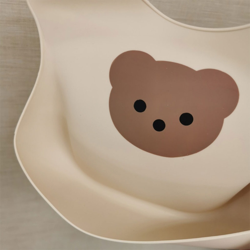 Yếm Ăn Silicone Cấp Thực Phẩm Chống Nước In Hình Gấu Có Túi Điều Chỉnh Được Dành Cho Trẻ Sơ Sinh