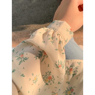 Áo sơ mi hoa xanh cổ tròn