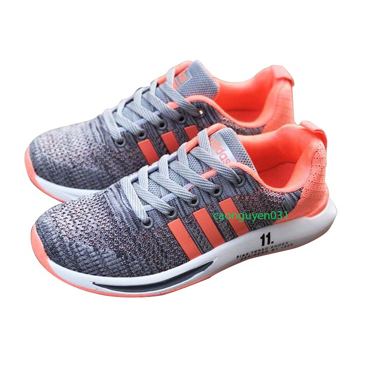 Giày thể thao nữ ghi cam