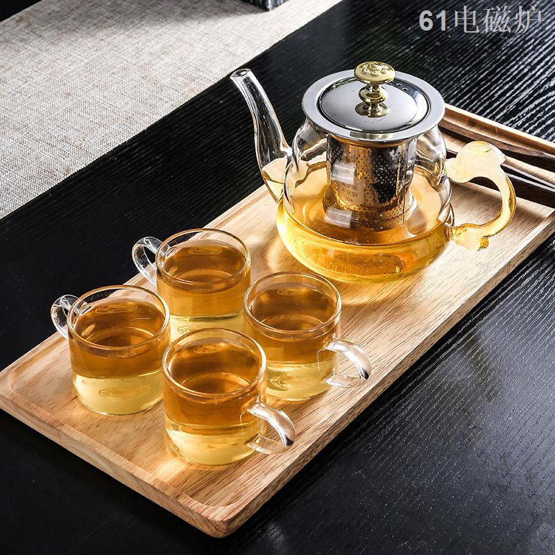 EẤm trà hoa thủy tinh chịu nhiệt dày lọc ấm trà điện bếp sứ bếp từ đun nóng ấm trà thủy tinh chống cháy nổ