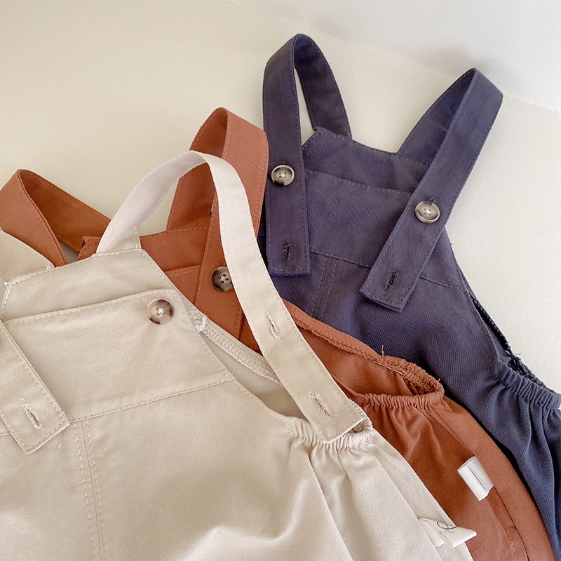 Quần yếm cho bé chất liệu vải thô khaki, có dây điều chỉnh, có túi hai bên phong cách cá tính dành cho bé từ 7-24kg