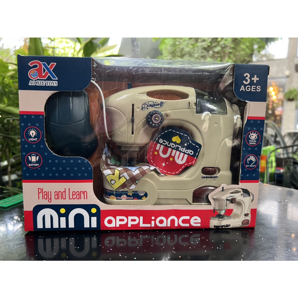 Máy may mini xài pin cho bé hàng đẹp