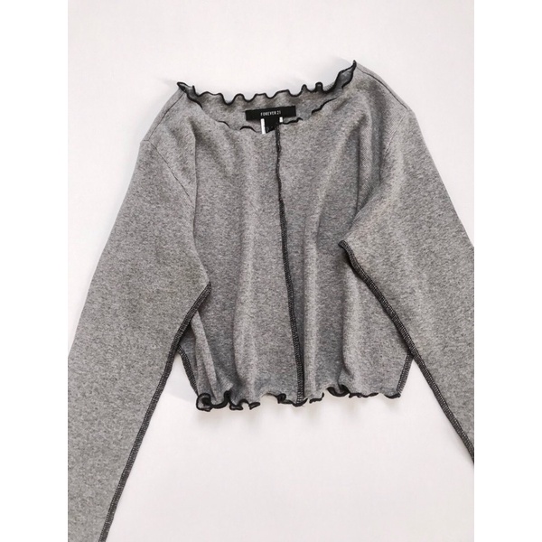 Set bộ áo croptop dài tay và quần ống loe