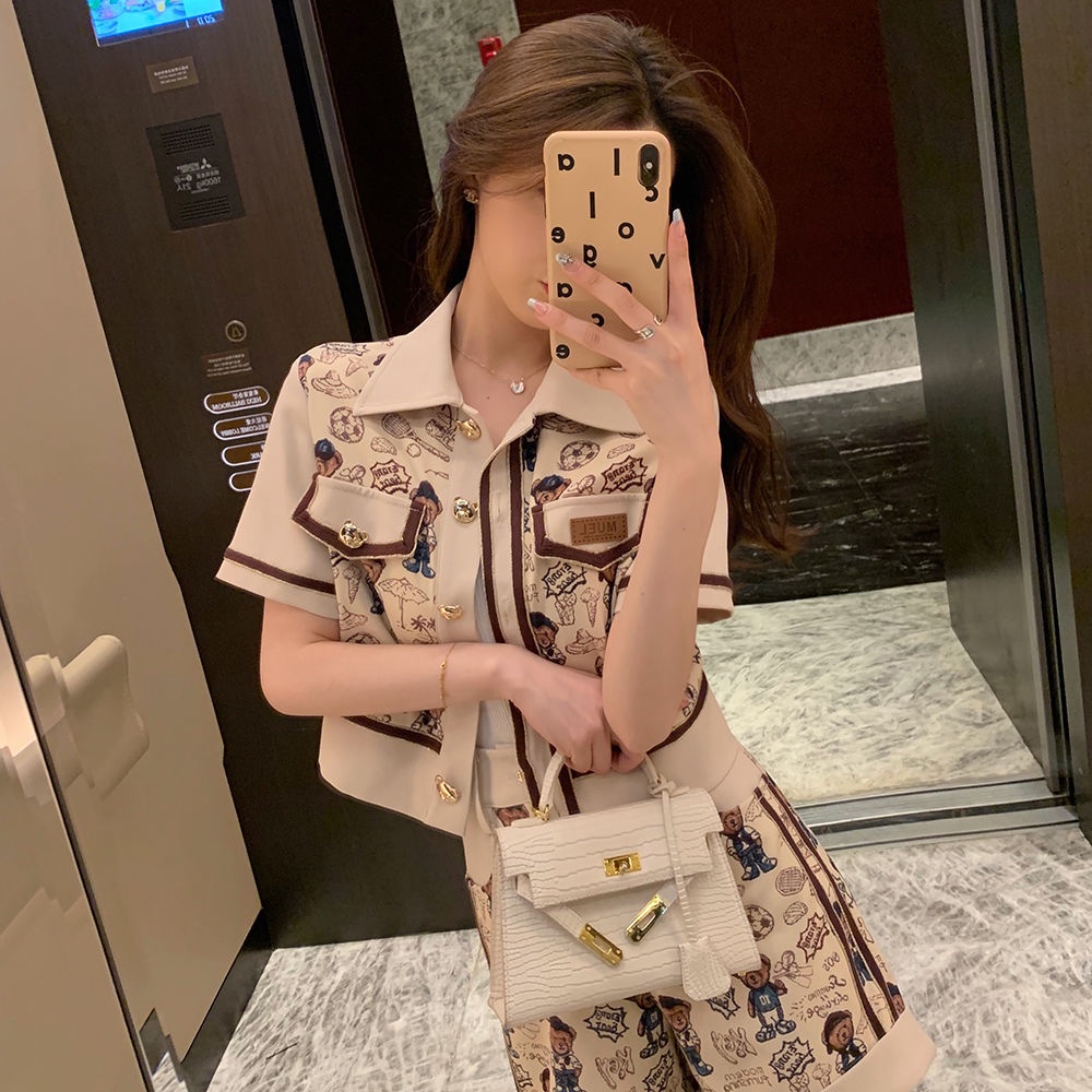 Set đồ 2 món gồm áo sơ mi tay ngắn và quần short thời trang trẻ trung cho nữ