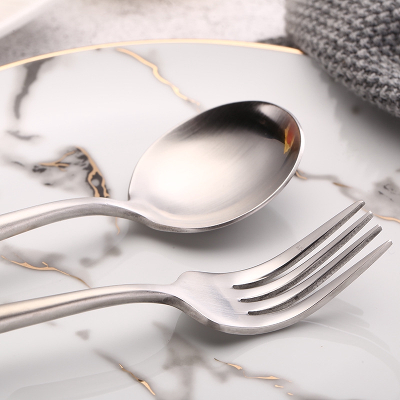 Western steak cutlery and Western style Portuguese silver knife and fork.