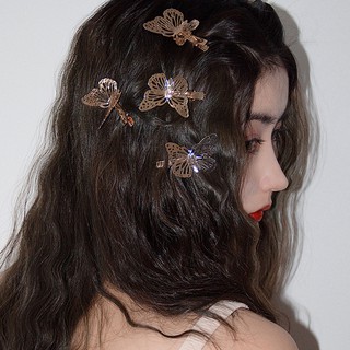 Cặp tóc hình bướm vàng