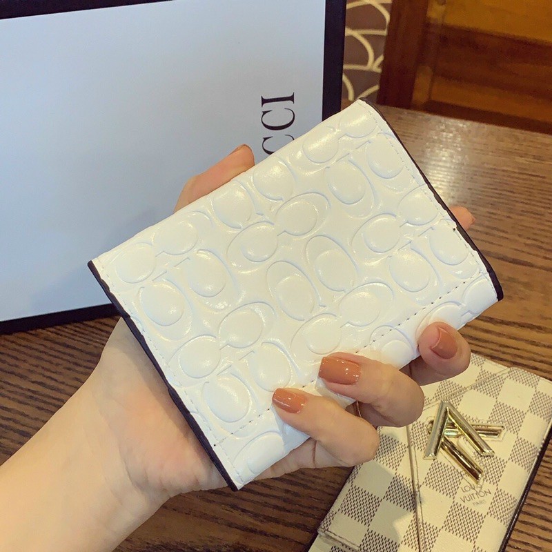 Ví COACH cầm tay