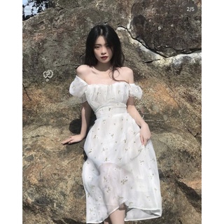 Đầm midi trắng hoa nhí cổ vuông xếp ly ngực cut-out lưng buộc nơ