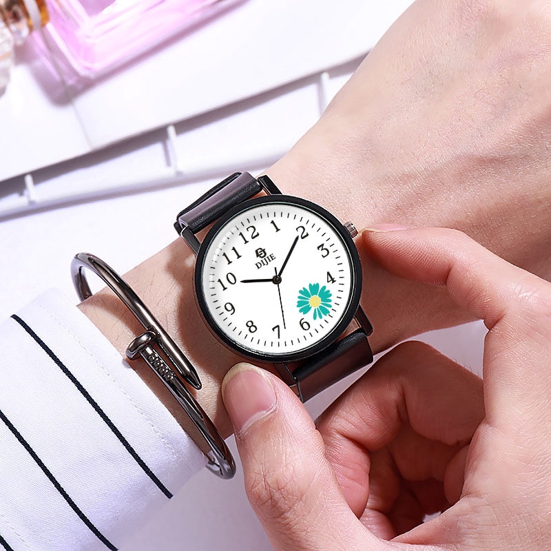 Đồng hồ kim nữ dây nhựa hoa cúc xanh HOT