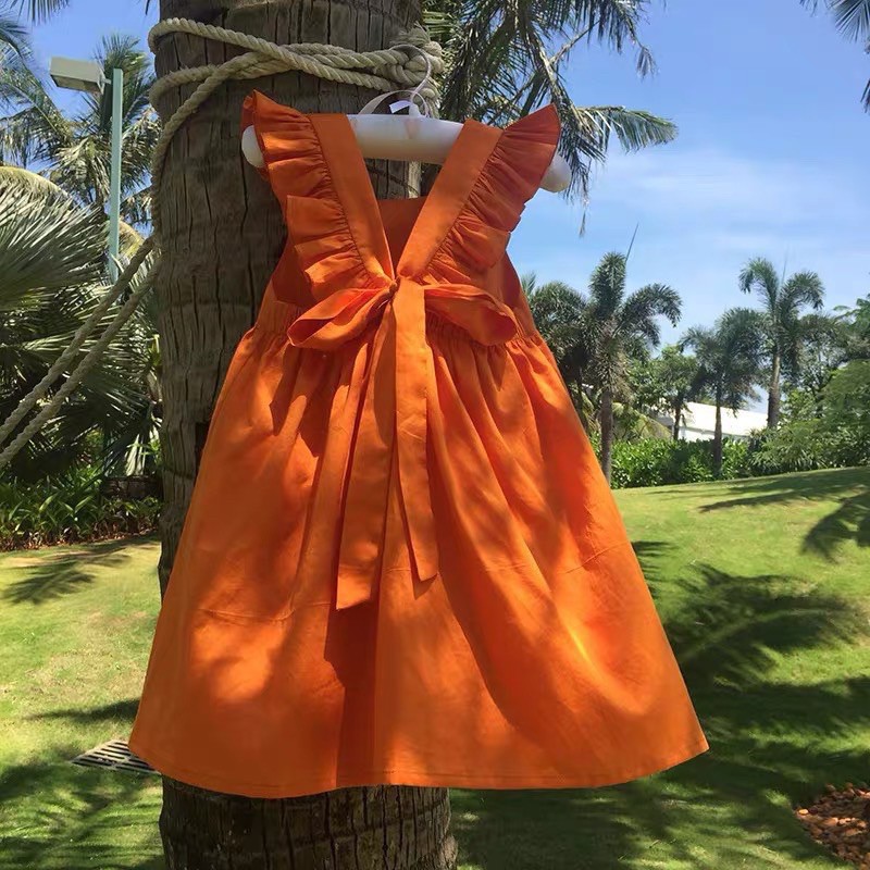 SET VÁY CAM THÔ ĐŨI TAY CÁNH TIÊN BUỘC NƠ SAU CHO BÉ GÁI