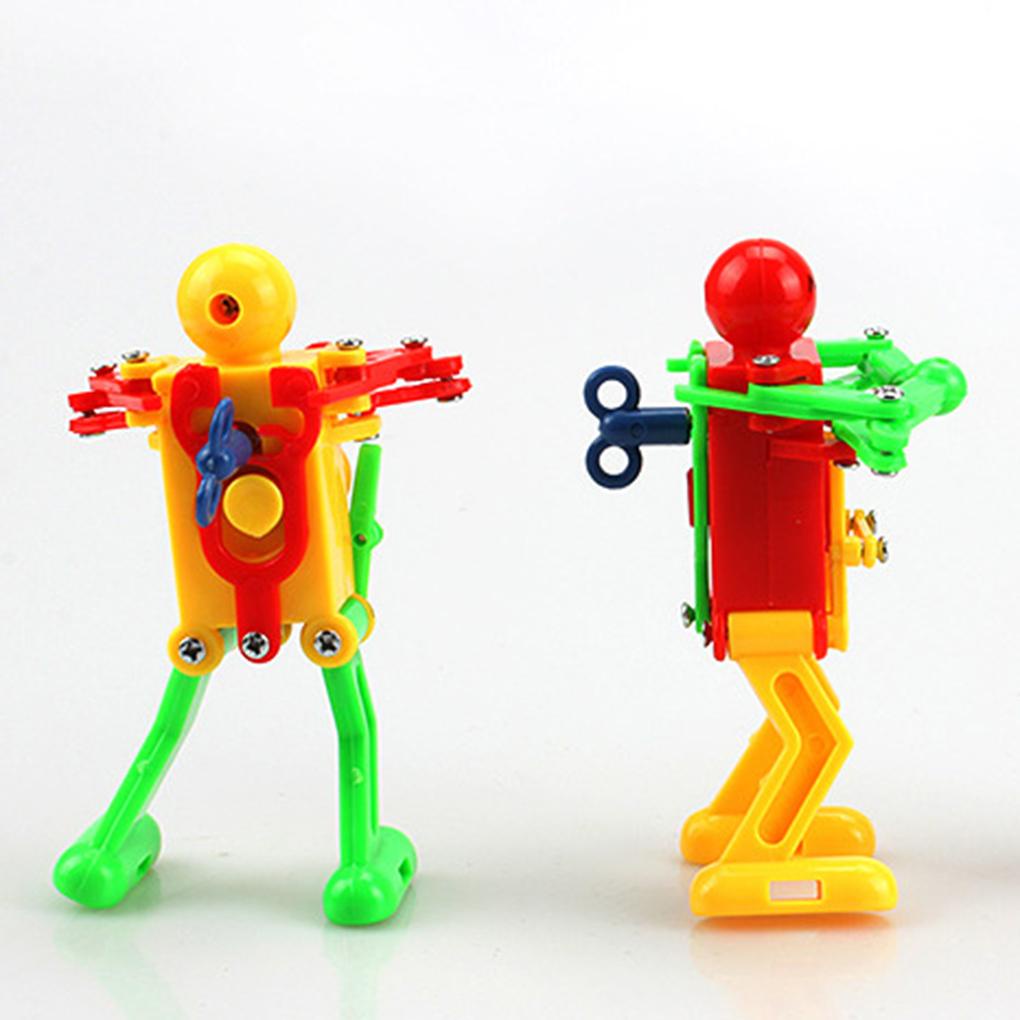 Set 3 Đồ Chơi Robot Nhảy Múa Lên Dây Cót Bằng Nhựa Màu Sắc Ngẫu Nhiên Cho Bé