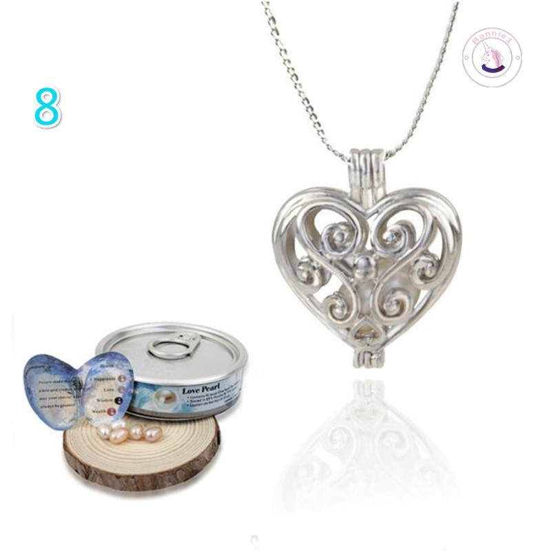 Dây chuyền màu bạc có mặt hình trái tim đính hạt ngọc xinh xắn