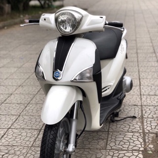Pha đèn trước xe Liberty hãng Piaggio