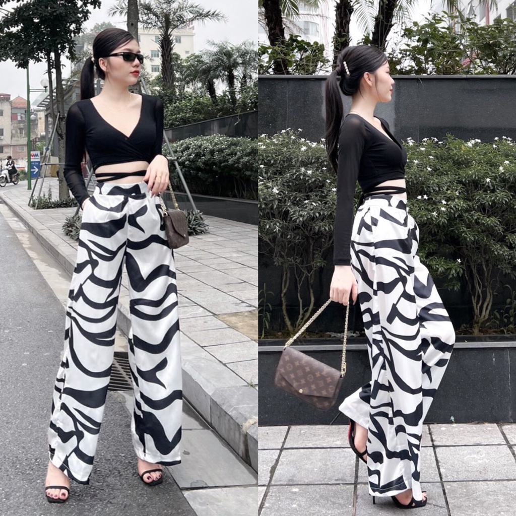 Set bộ nữ cổ tim xẻ ngực tay dài cột dấy eo kèm quần ống rộng họa tiêt beo văn lưng cao thể thao năng động