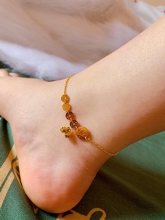 Lắc chân titan đồng xu cổ