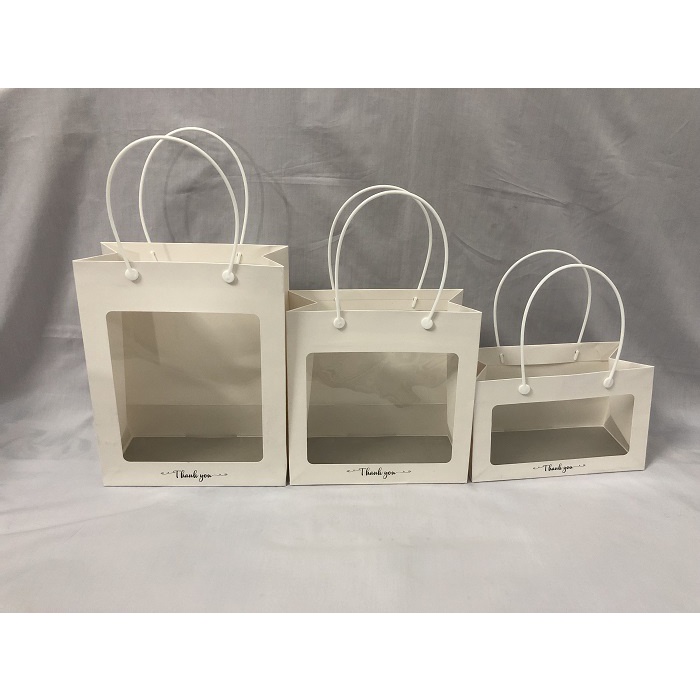 Túi giấy trắng mặt kiếng có quai xách có 3 kích thước/túi