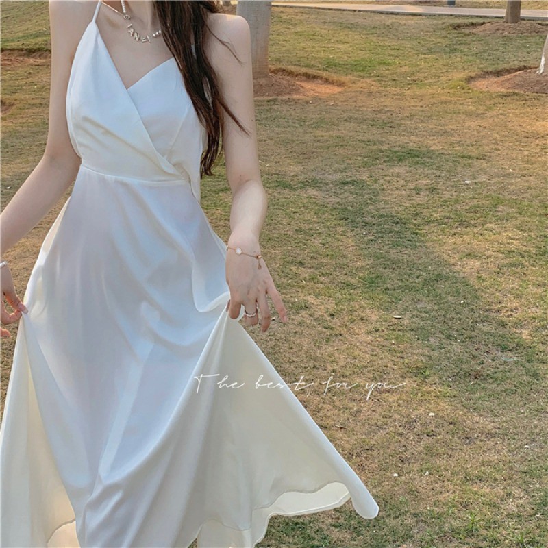 xa (ORDER) Váy hai dây màu trắng cỏ V thắt nơ sau lưng dây đan chéo nữ tính gợi cảm mùa hè (HÀNG MỚI VỀ) h