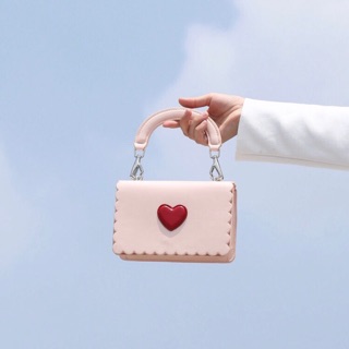 Túi xách trái tim charles & keith hàng xuất