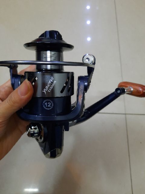 Máy câu cá kim loại tx 3000-7000