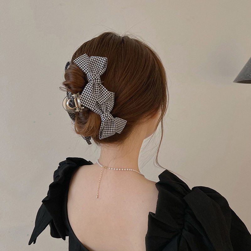 Kẹp tóc thắt nơ họa tiết caro trắng đen dành cho bạn nữ