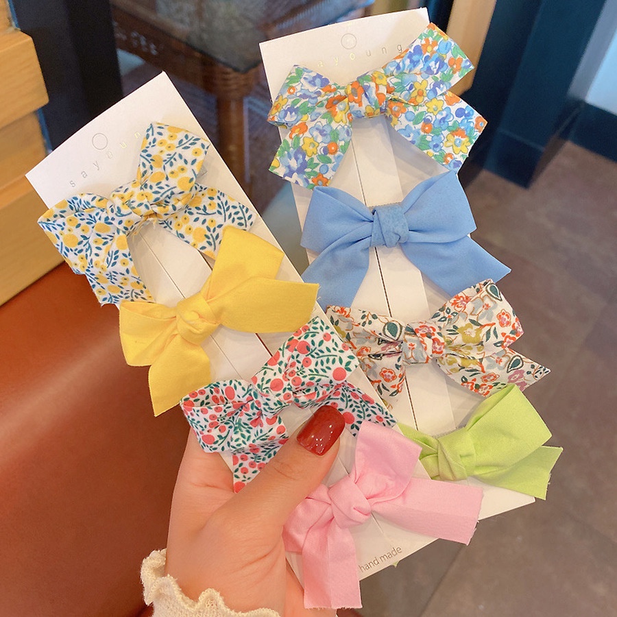 (Bán Buôn Sỉ) Set 2 Kẹp Tóc Nơ Chấm Bi Cho Bé Gái