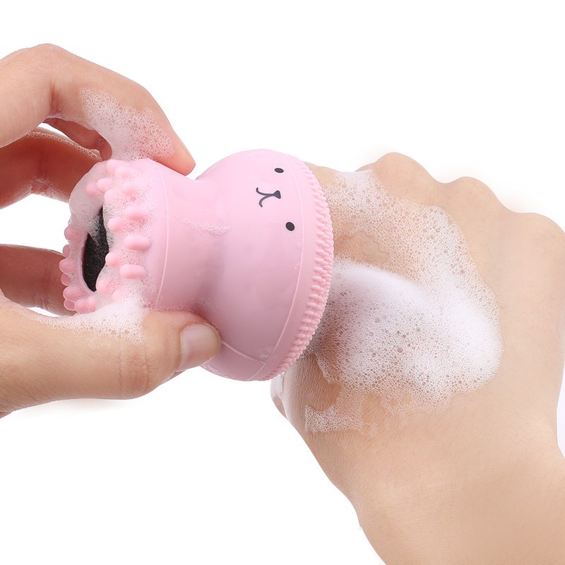 Một cây cọ silicon bạch tuộc giúp làm sạch lỗ chân lông và tế bào tẩy