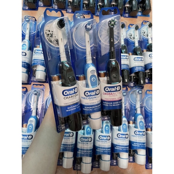 Bàn Chải Pin Oral-B Clinical - Nhiều loại đầu - Dùng Pin AA - Hẹn giờ 2 phút